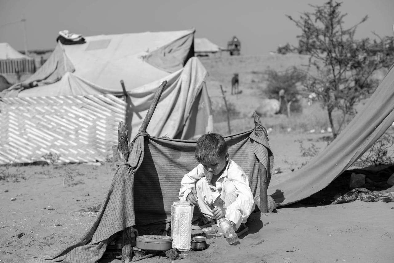 services-02 Kid Playing at a Desert Campsite